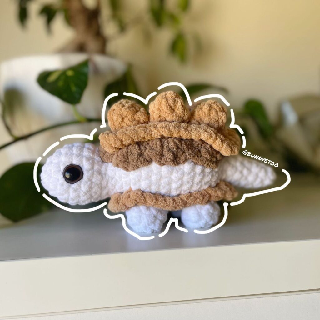 Stegosmoreus handmade crochet plushie by Bunnyetoo